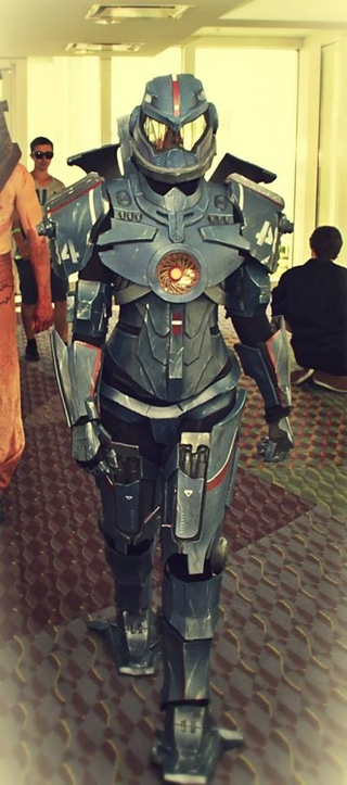 Illustration for article titled Lady Gipsy Danger Cosplay From Pacific Rim Has Her Own Robot Sword